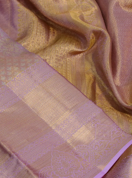 Kanchipuram tissue silk saree dual shade of lavender with allover silver zari woven brocade weaves and long zari woven border