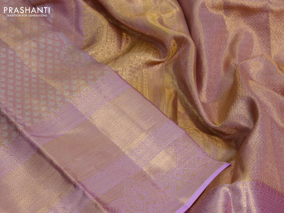 Kanchipuram tissue silk saree dual shade of lavender with allover silver zari woven brocade weaves and long zari woven border