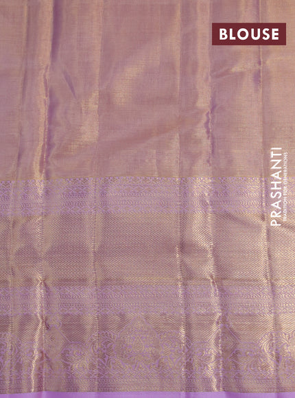 Kanchipuram tissue silk saree dual shade of lavender with allover silver zari woven brocade weaves and long zari woven border