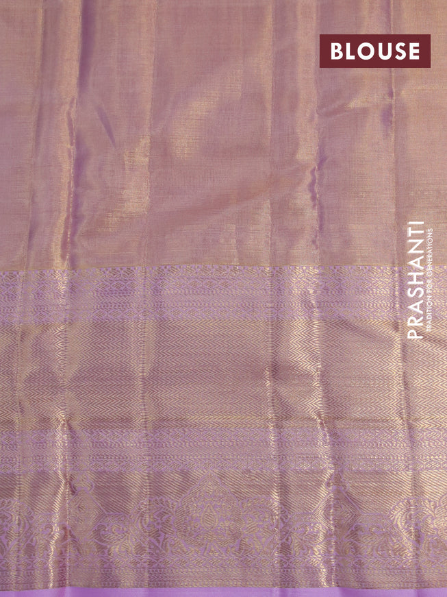 Kanchipuram tissue silk saree dual shade of lavender with allover silver zari woven brocade weaves and long zari woven border