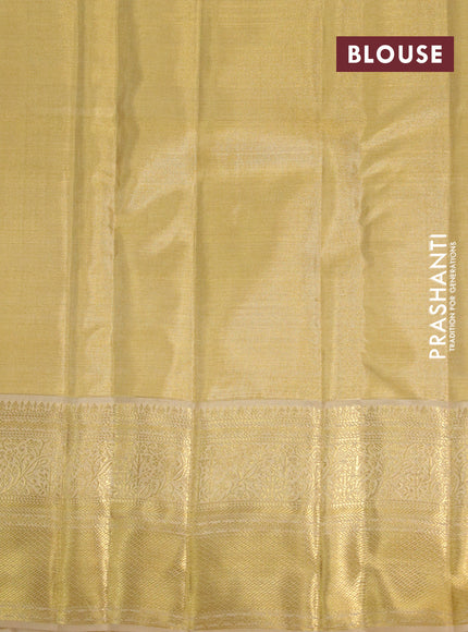 Kanchipuram tissue silk saree sandal with allover silver zari woven brocade weaves and zari woven border