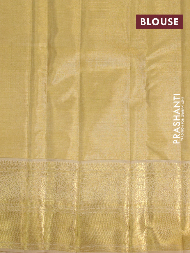 Kanchipuram tissue silk saree sandal with allover silver zari woven brocade weaves and zari woven border