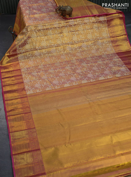 Kanchipuram tissue silk saree dual shade of gold and pink with allover zari woven brocade weaves and long zari woven border