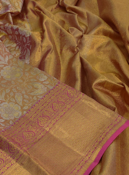 Kanchipuram tissue silk saree dual shade of gold and pink with allover zari woven brocade weaves and long zari woven border