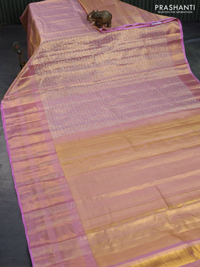 Kanchipuram tissue silk saree dual shade of gold and light pink with allover silver zari woven brocade weaves and long zari woven border