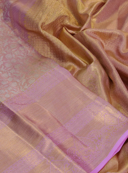 Kanchipuram tissue silk saree dual shade of gold and light pink with allover silver zari woven brocade weaves and long zari woven border