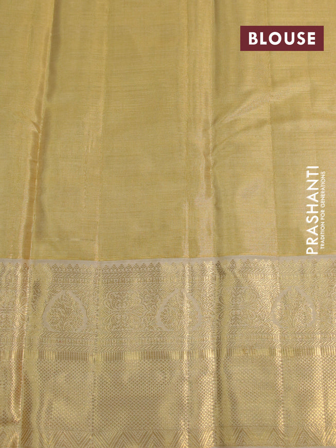 Kanchipuram tissue silk saree sandal and cream with allover silver zari woven brocade weaves and long zari woven border