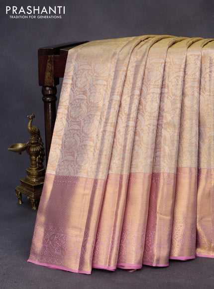 Kanchipuram tissue silk saree dual shade of gold and light pink with allover silver zari woven brocade weaves and long zari woven border