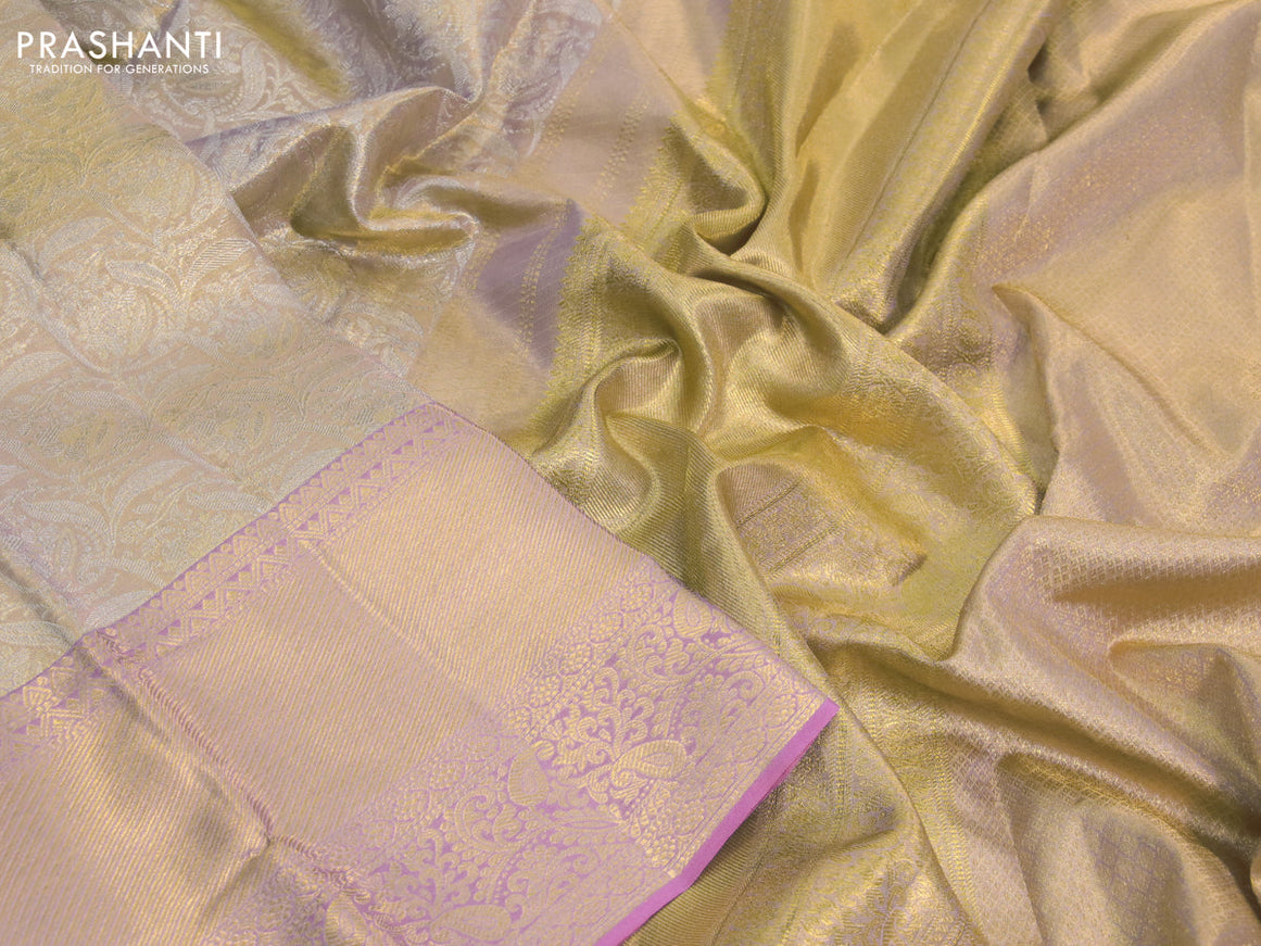 Kanchipuram tissue silk saree dual shade of gold and light pink with allover silver zari woven brocade weaves and long zari woven border