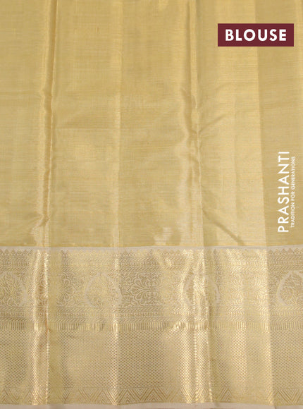 Kanchipuram tissue silk saree dual shade of gold and sandal with allover silver zari woven brocade weaves and long zari woven border