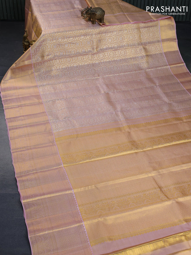 Kanchipuram tissue silk saree dual shade of mild peach with allover silver zari woven brocade weaves and long zari woven border