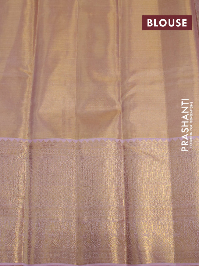 Kanchipuram tissue silk saree dual shade of mild peach with allover silver zari woven brocade weaves and long zari woven border