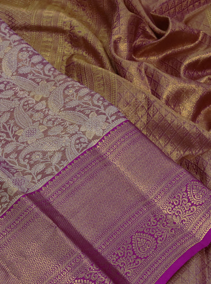 Kanchipuram tissue silk saree dual shade of gold and pink with allover silver zari woven brocade weaves and long zari woven border