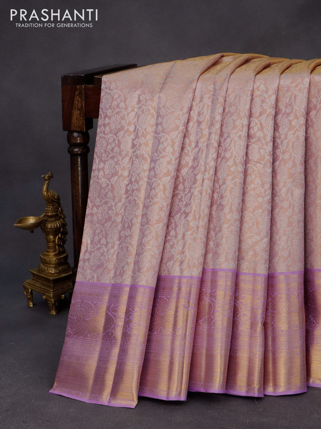 Kanchipuram tissue silk saree dual shade of mild lavender and lavender with allover silver zari woven brocade weaves and long zari woven border