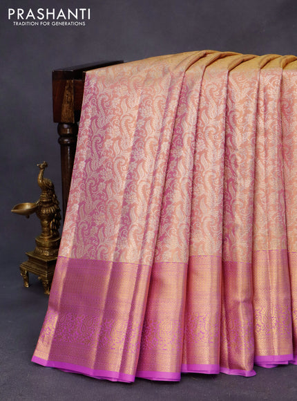 Kanchipuram tissue silk saree dual shade of gold and light pink with allover silver zari woven brocade weaves and long zari woven border