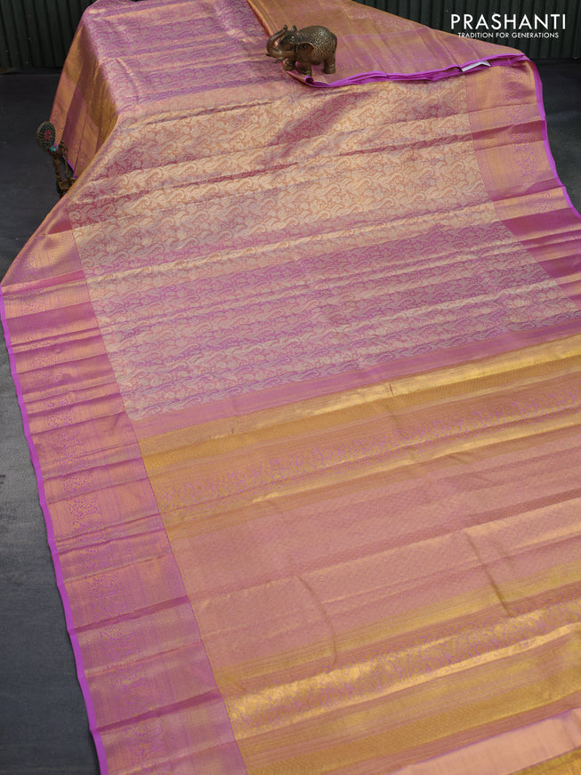 Kanchipuram tissue silk saree dual shade of gold and light pink with allover silver zari woven brocade weaves and long zari woven border