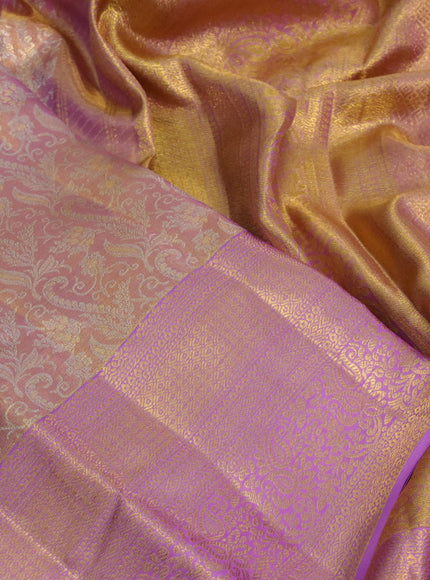 Kanchipuram tissue silk saree dual shade of gold and light pink with allover silver zari woven brocade weaves and long zari woven border