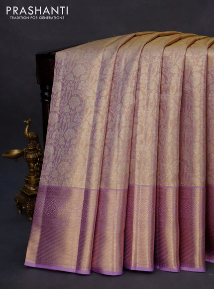 Kanchipuram tissue silk saree dual shade of lavender with allover silver zari woven brocade weaves and long zari woven border