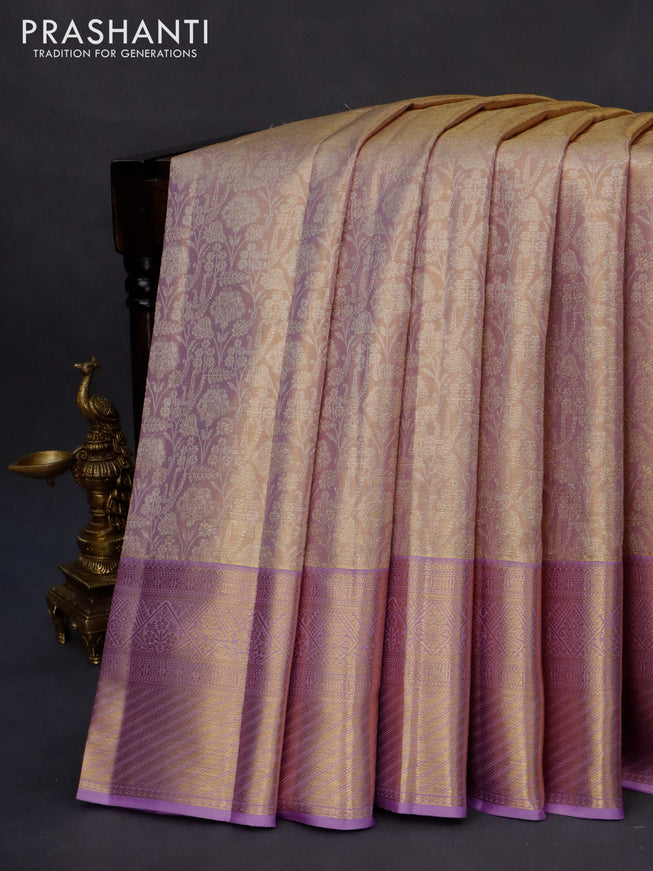 Kanchipuram tissue silk saree dual shade of lavender with allover silver zari woven brocade weaves and long zari woven border