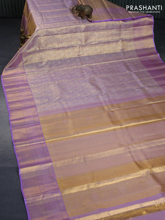 Kanchipuram tissue silk saree dual shade of lavender with allover silver zari woven brocade weaves and long zari woven border