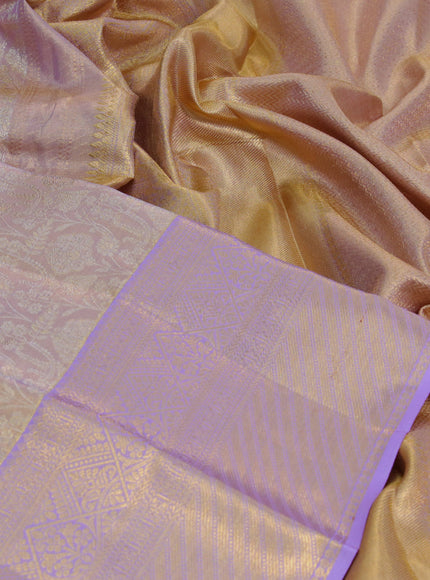 Kanchipuram tissue silk saree dual shade of lavender with allover silver zari woven brocade weaves and long zari woven border