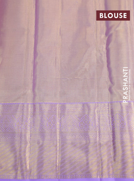 Kanchipuram tissue silk saree dual shade of lavender with allover silver zari woven brocade weaves and long zari woven border