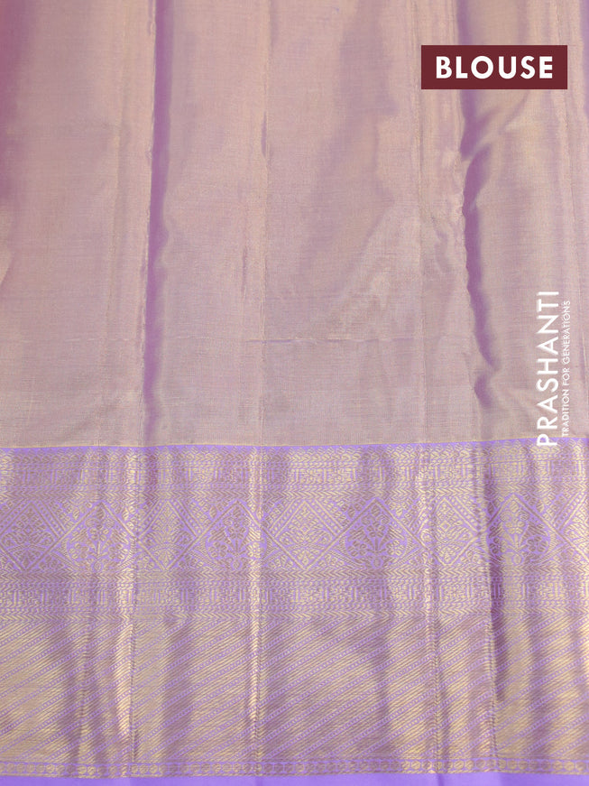 Kanchipuram tissue silk saree dual shade of lavender with allover silver zari woven brocade weaves and long zari woven border