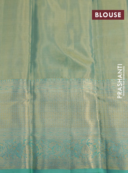 Kanchipuram tissue silk saree dual shade of teal blue with allover silver zari woven brocade weaves and long zari woven border