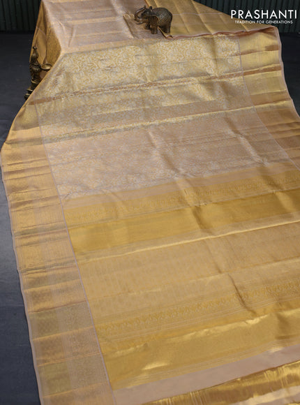 Kanchipuram tissue silk saree gold and dark sandal with allover silver zari woven brocade weaves and long zari woven border