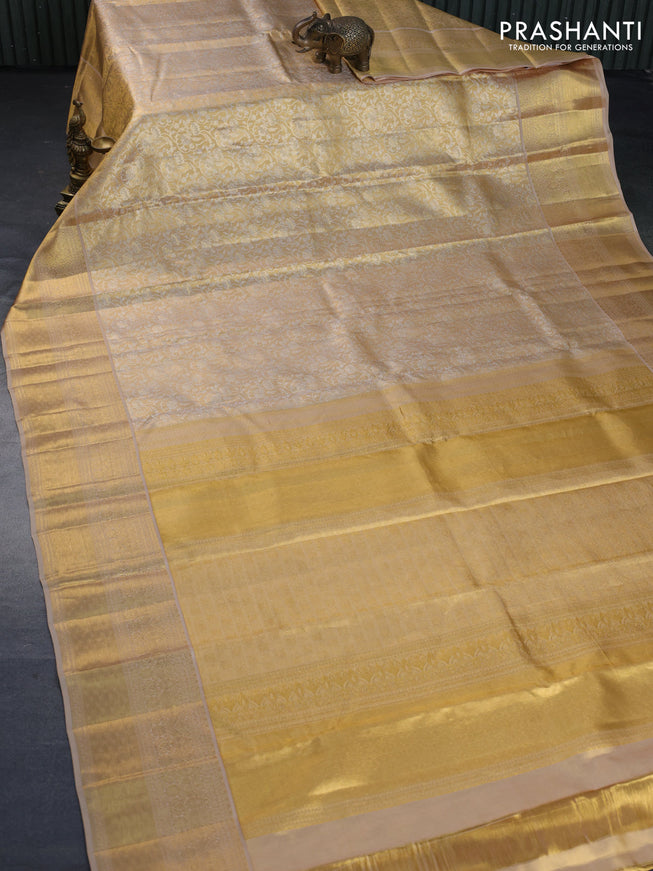 Kanchipuram tissue silk saree gold and dark sandal with allover silver zari woven brocade weaves and long zari woven border