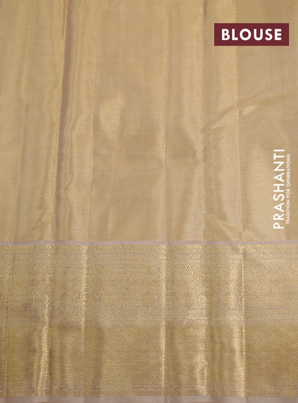 Kanchipuram tissue silk saree gold and dark sandal with allover silver zari woven brocade weaves and long zari woven border