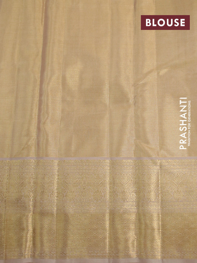 Kanchipuram tissue silk saree gold and dark sandal with allover silver zari woven brocade weaves and long zari woven border