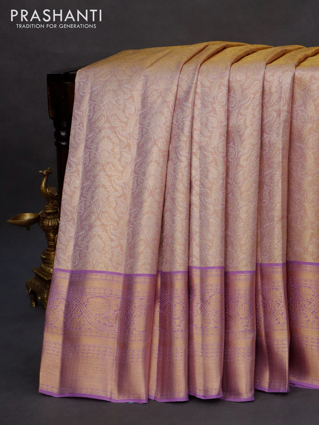 Kanchipuram tissue silk saree dual shade of gold and lavender shade with allover zari woven brocade weaves and long zari woven border