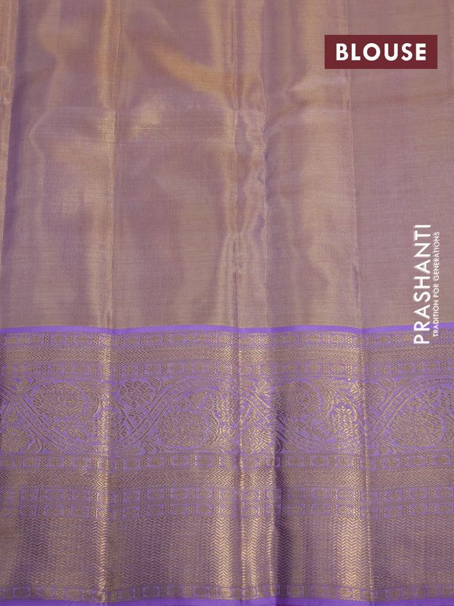 Kanchipuram tissue silk saree dual shade of gold and lavender shade with allover zari woven brocade weaves and long zari woven border