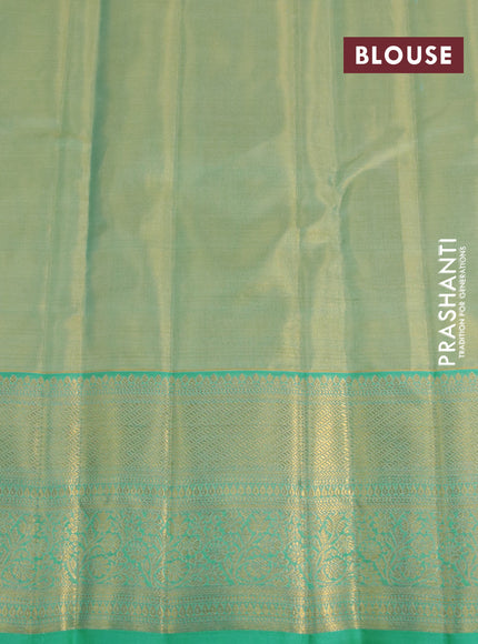 Kanchipuram tissue silk saree dual shade of teal blue with allover silver zari woven brocade weaves and long zari woven border