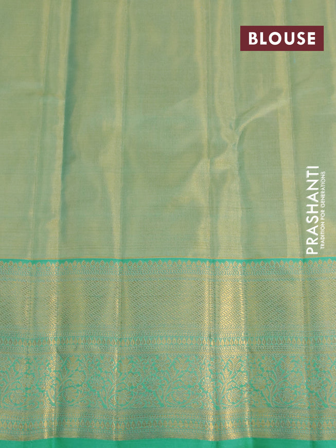 Kanchipuram tissue silk saree dual shade of teal blue with allover silver zari woven brocade weaves and long zari woven border