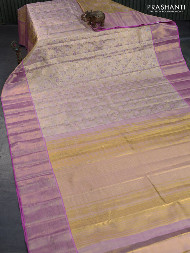 Kanchipuram tissue silk saree dual shade of gold and light pink with allover zari woven brocade weaves and long zari woven border