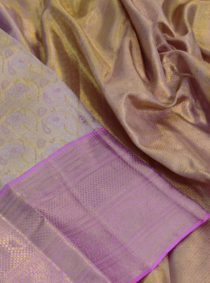 Kanchipuram tissue silk saree dual shade of gold and light pink with allover zari woven brocade weaves and long zari woven border