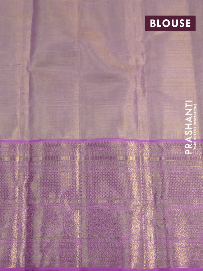 Kanchipuram tissue silk saree dual shade of gold and light pink with allover zari woven brocade weaves and long zari woven border