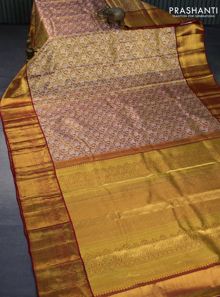 Kanchipuram tissue silk saree dual shade of gold and red with allover silver zari woven brocade weaves and long zari woven border