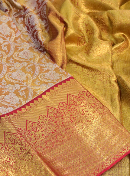 Kanchipuram tissue silk saree dual shade of gold and red with allover silver zari woven brocade weaves and long zari woven border