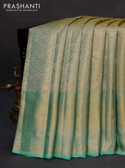 Kanchipuram tissue silk saree dual shade of teal blue with allover zari woven brocade weaves and long zari woven border