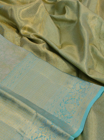 Kanchipuram tissue silk saree dual shade of teal blue with allover zari woven brocade weaves and long zari woven border