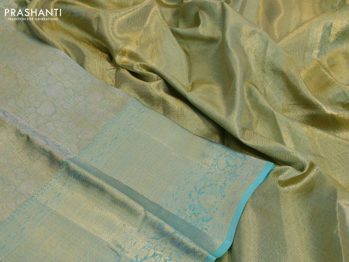 Kanchipuram tissue silk saree dual shade of teal blue with allover zari woven brocade weaves and long zari woven border