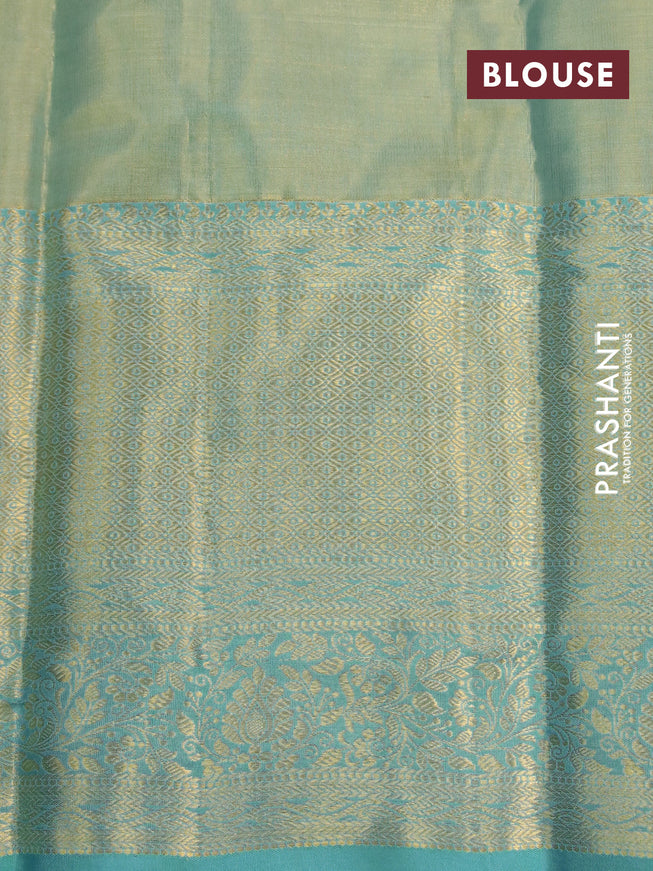 Kanchipuram tissue silk saree dual shade of teal blue with allover zari woven brocade weaves and long zari woven border