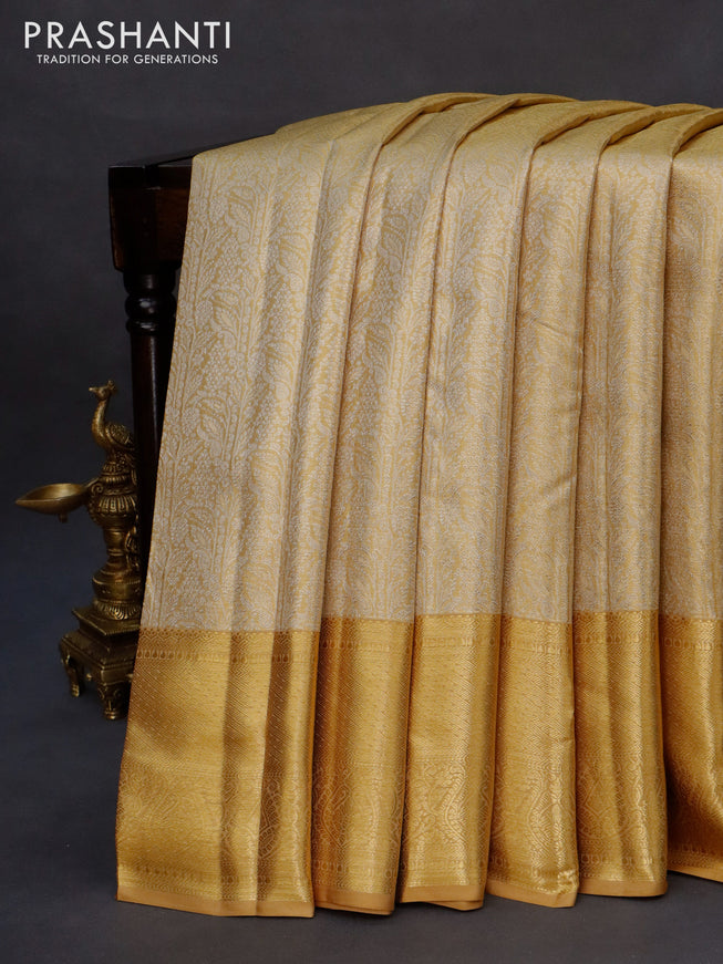 Kanchipuram tissue silk saree gold with allover silver zari woven brocade weaves and zari woven border