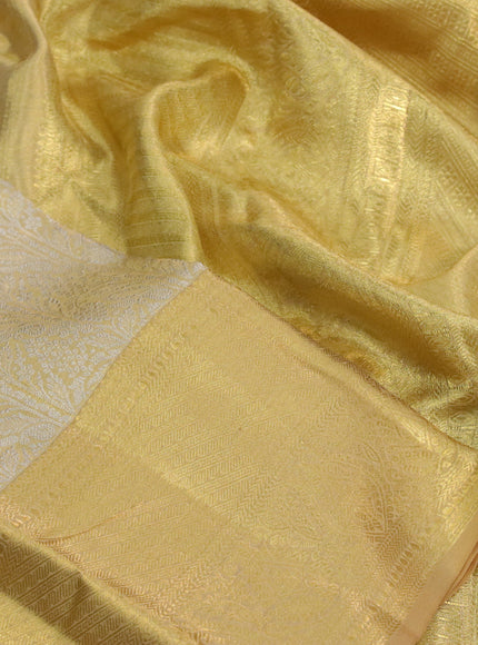 Kanchipuram tissue silk saree gold with allover silver zari woven brocade weaves and zari woven border