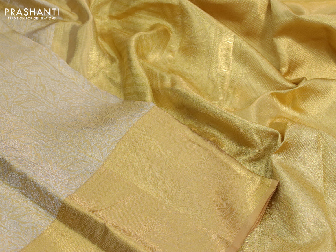 Kanchipuram tissue silk saree gold with allover silver zari woven brocade weaves and zari woven border