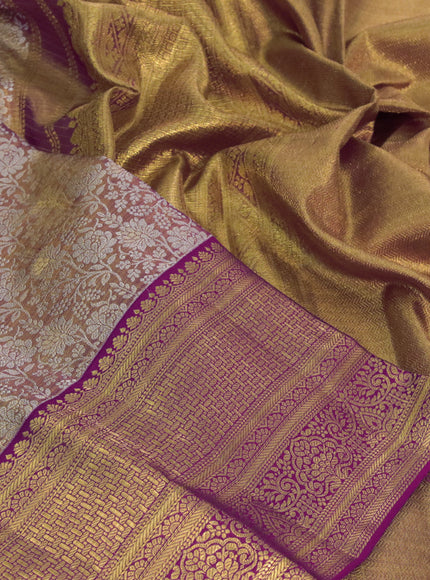 Kanchipuram tissue silk saree dual shade of gold and pink with allover silver zari woven brocade weaves and zari woven border