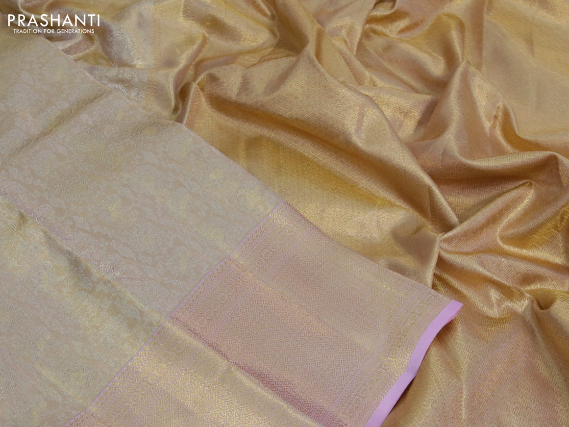 Kanchipuram tissue silk saree cream and light pink with allover silver zari woven brocade weaves and zari woven border